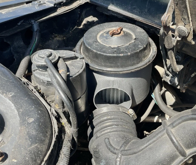 Fiero GT airbox installed with intake tube connected